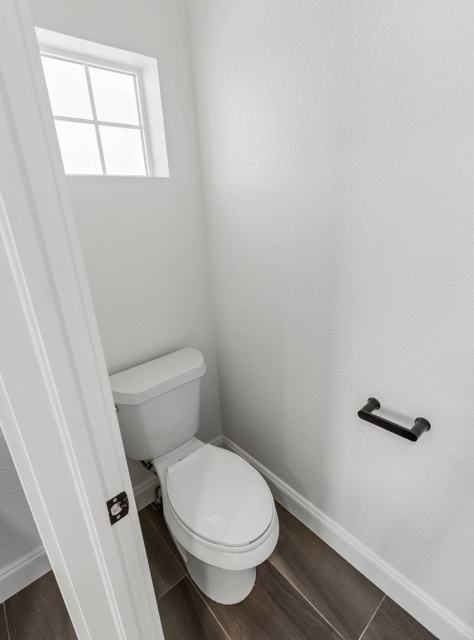 master suite bedroom and bathroom in Commerce City