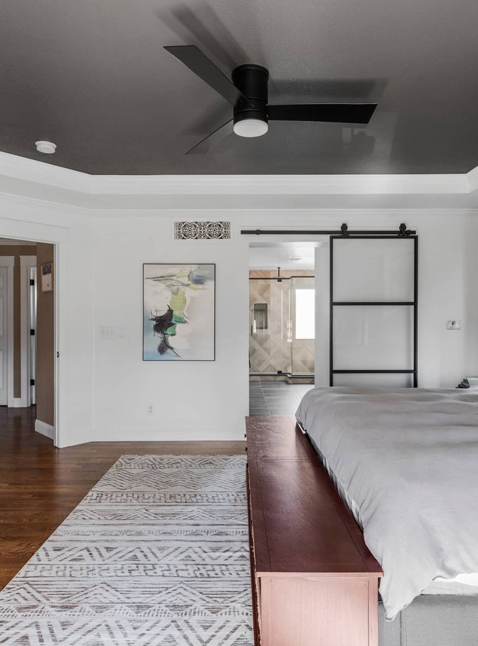 master suite bedroom and bathroom in Commerce City