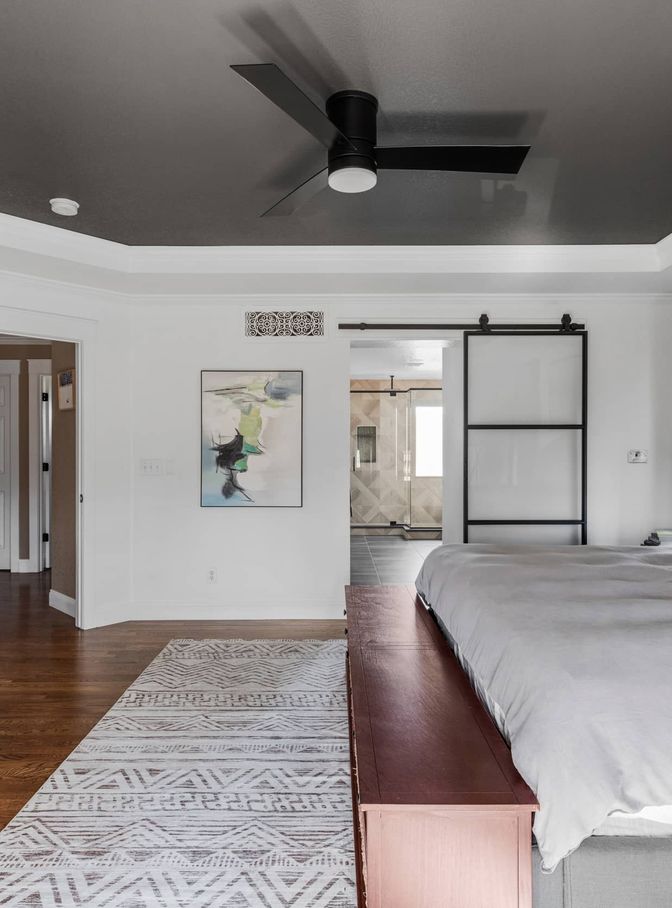 master suite bedroom and bathroom in Commerce City